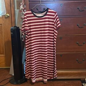 A red, white, and black T-shirt dress, very comfy and loose fitted